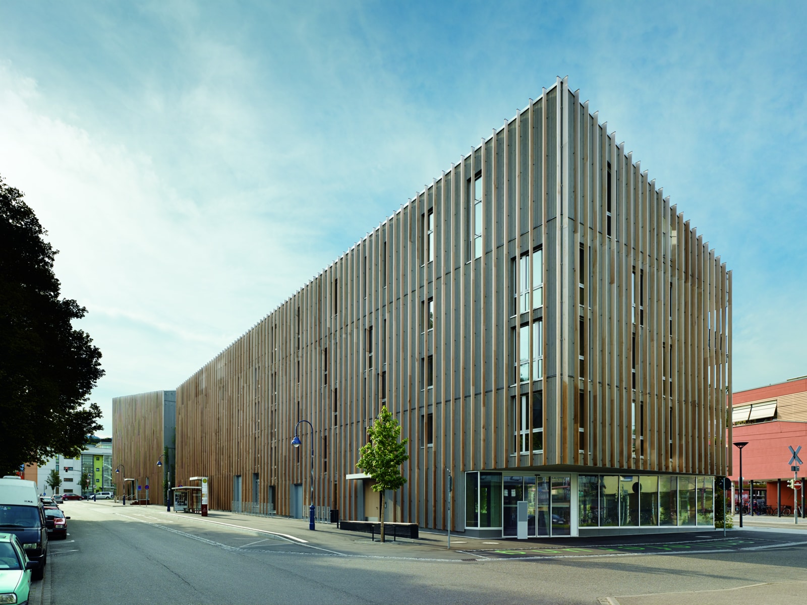 Image of a mixed use building with a wood facade