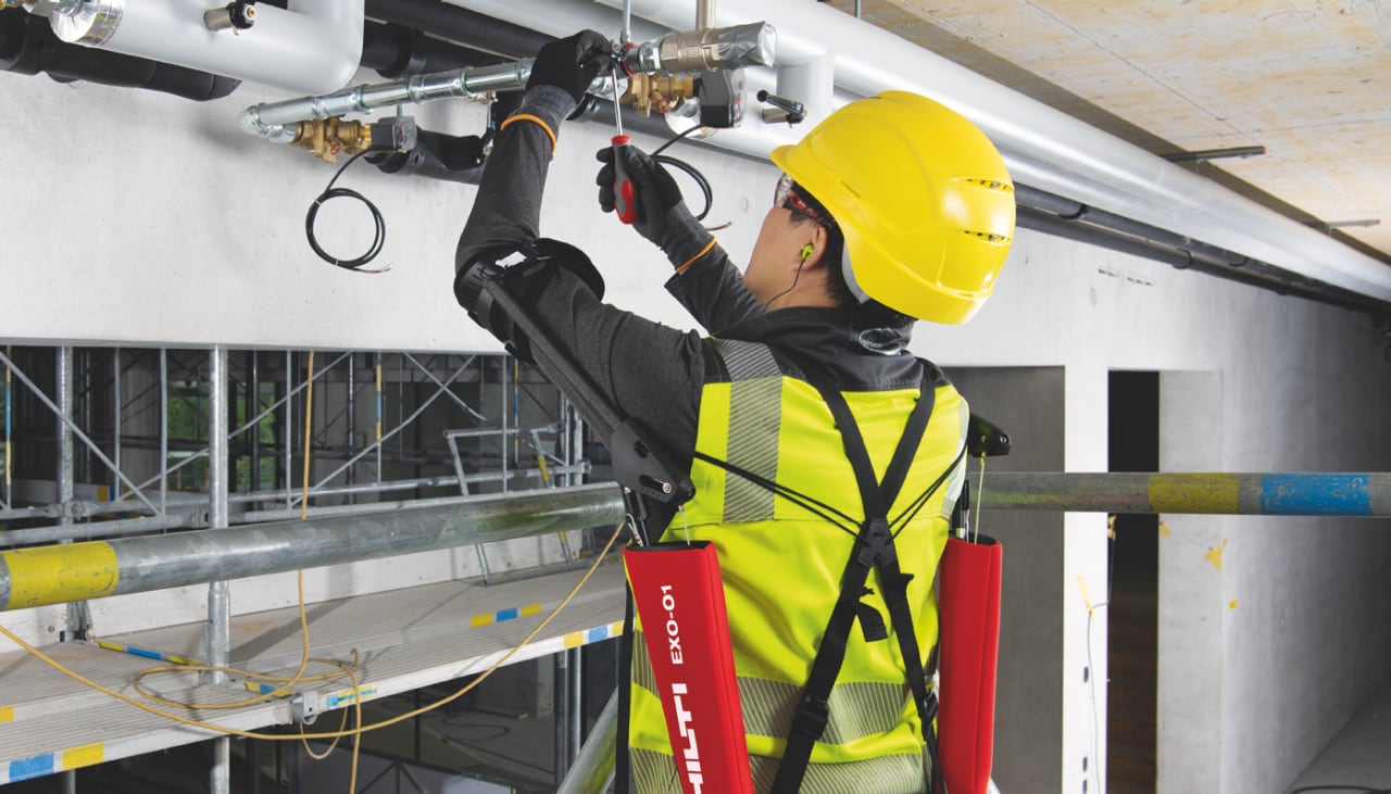 man wearing Hilti exoskeleton