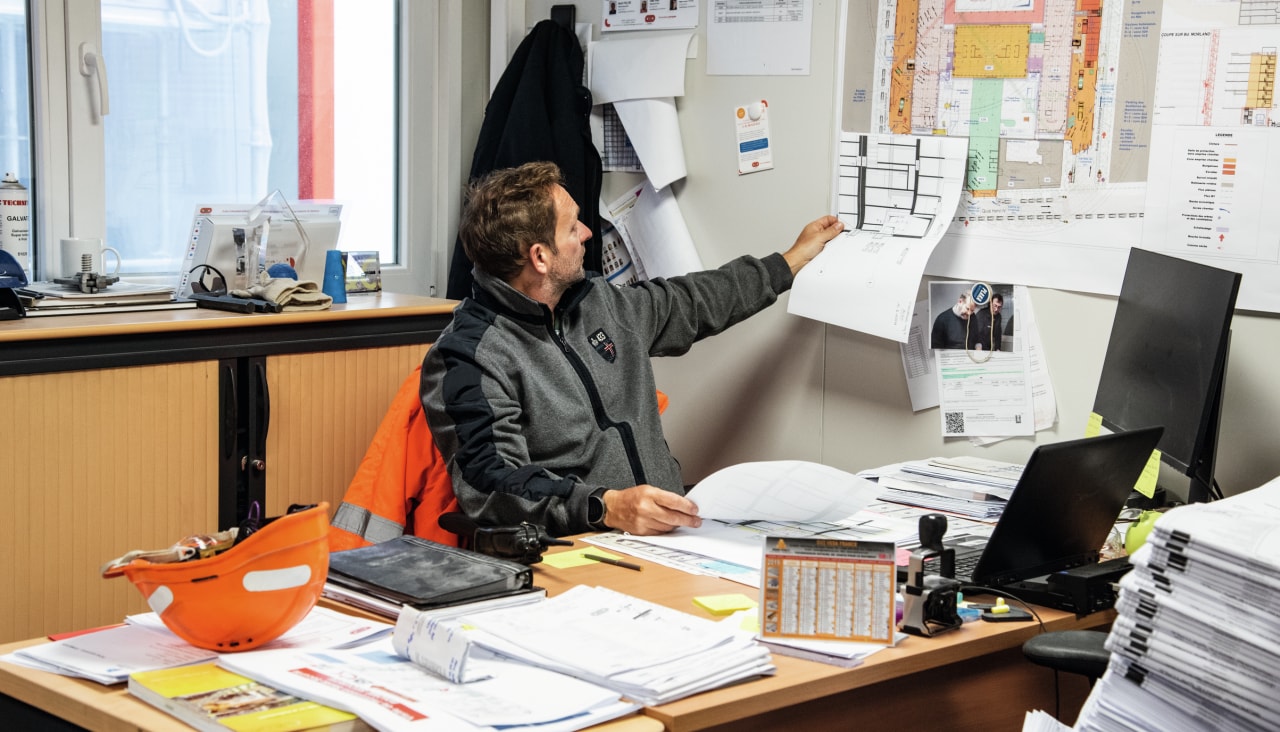 man planning his schedule for the construction project