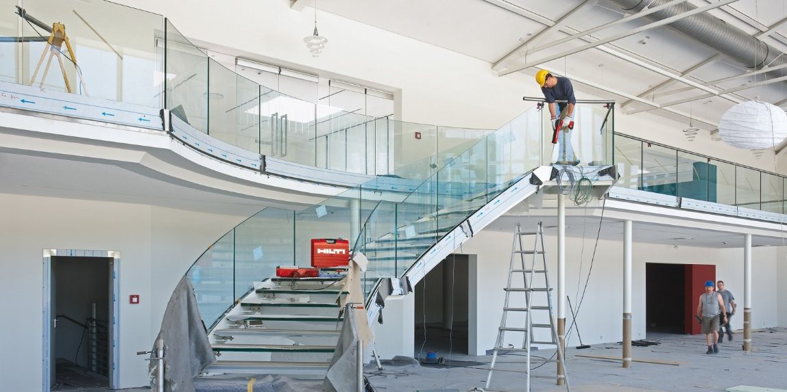 man building a staircase in a jobsite