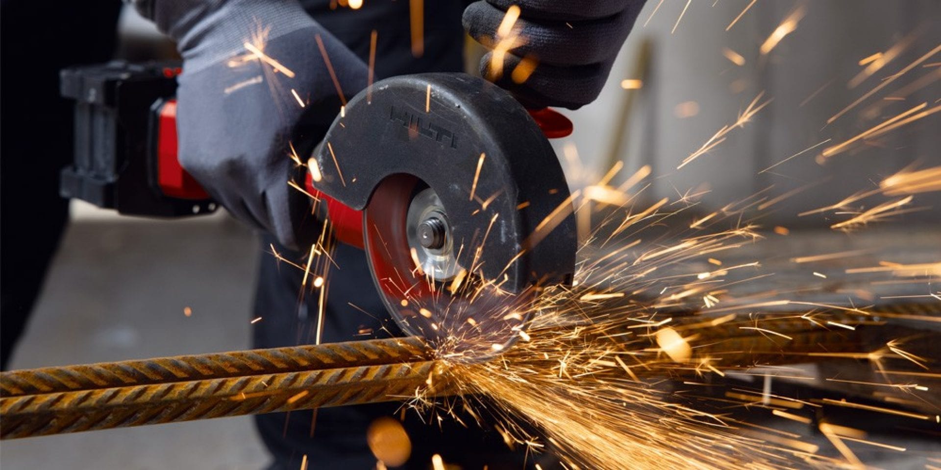 Nuron cordless angle grinder cutting metal