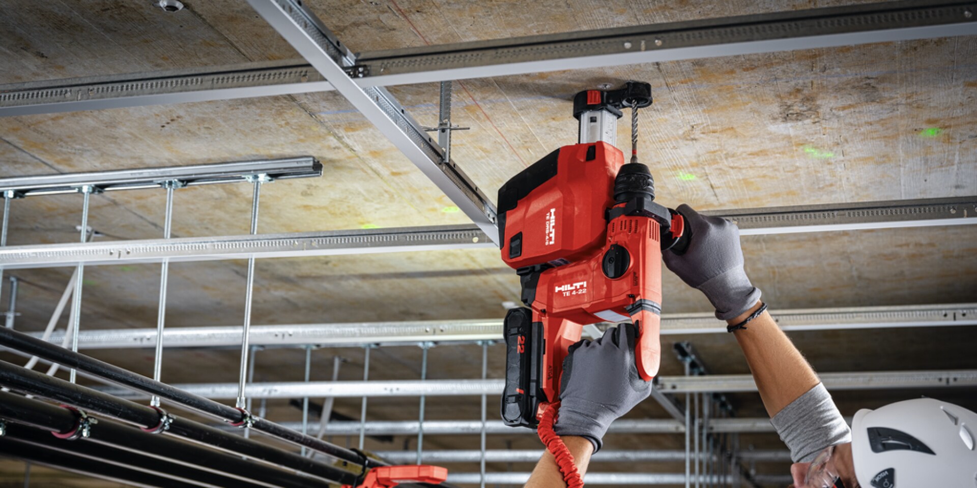 A person works with the Hilti Nuron TE 4-22 cordless rotary hammer.