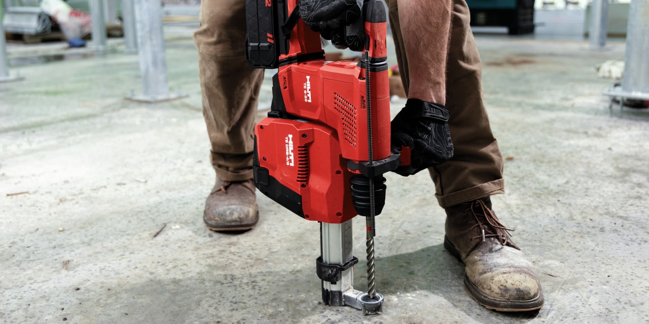 TE 6-A22 cordless rotary hammer being used with an integrated dust removal system