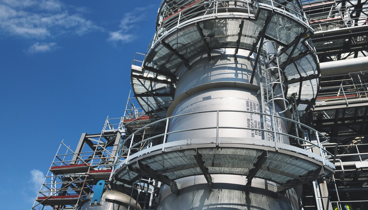image of a oil refinery and its metal platforms