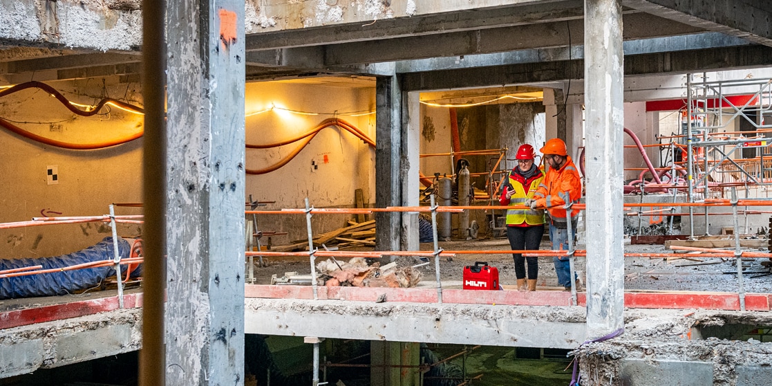 workers talking on a jobsite