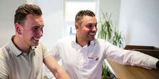 Hilti rep with customer in office