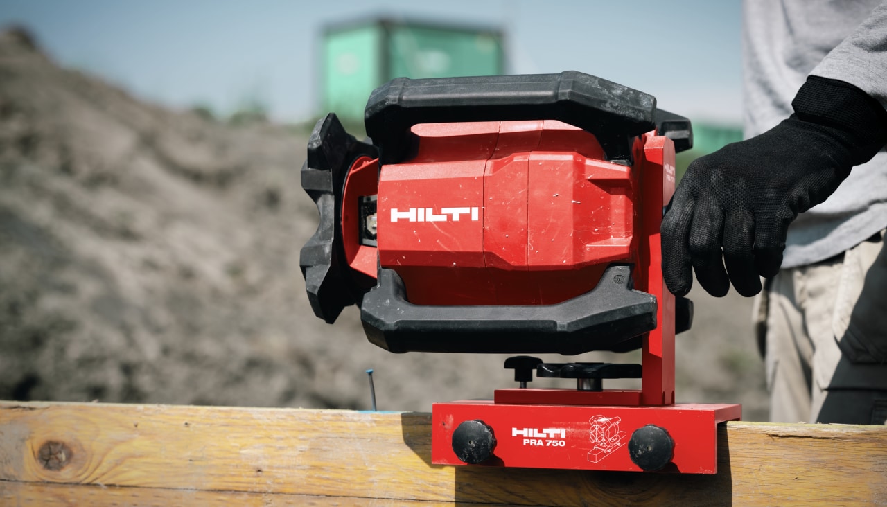 man using Hilti rotating laser on jobsite