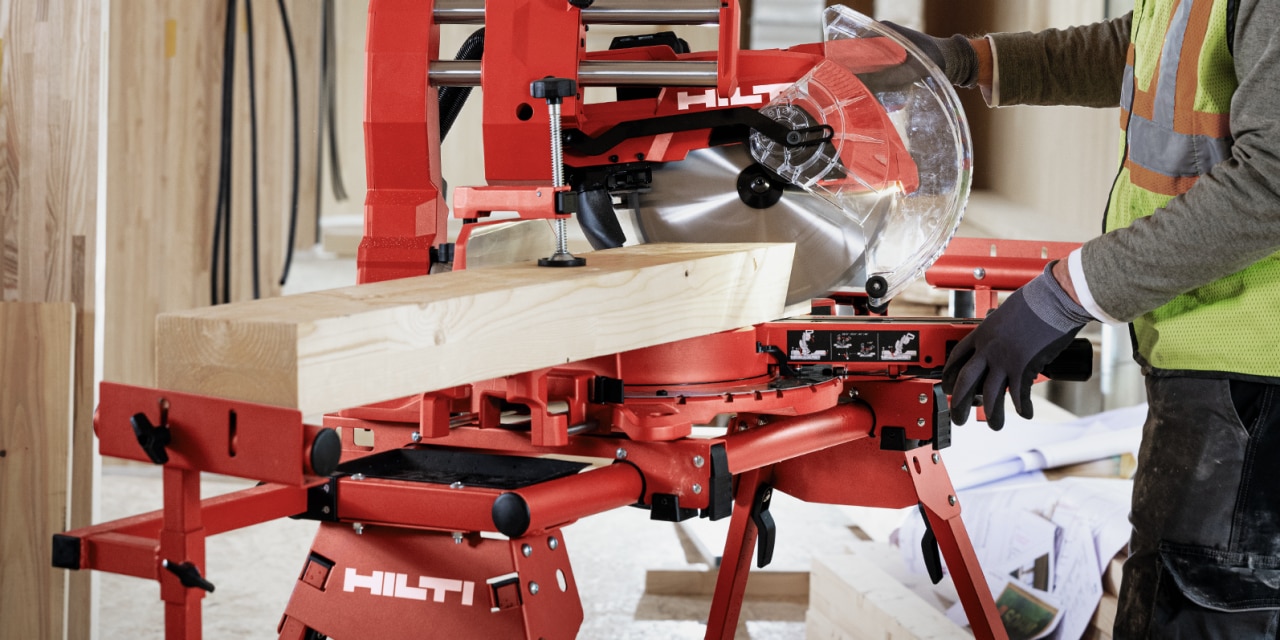 man using hilti mitre saw
