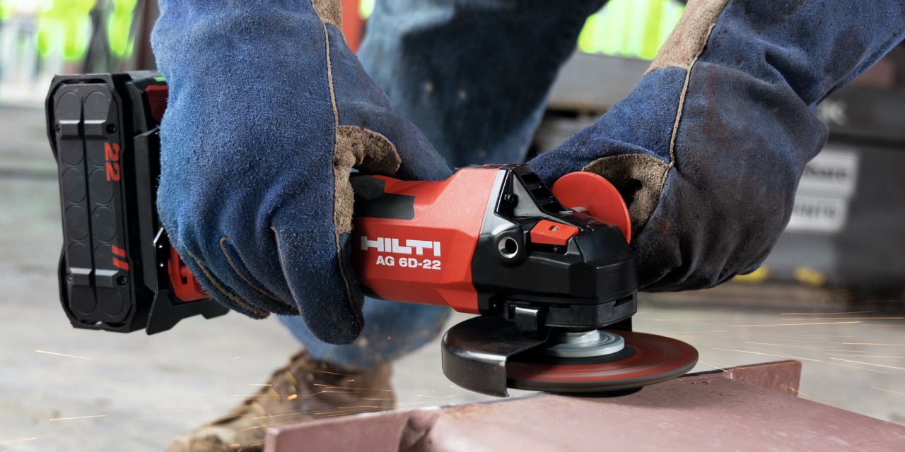 man using hilti angle grinder