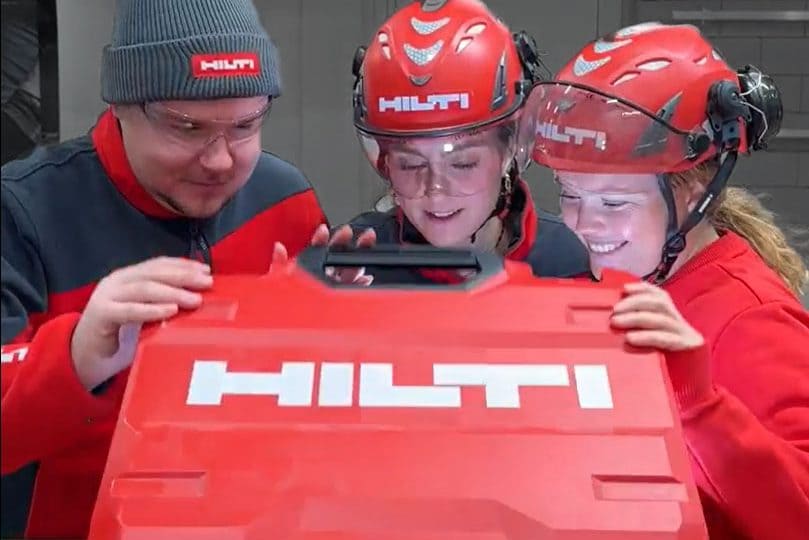 Three Hilti reps looking into a new toolbox