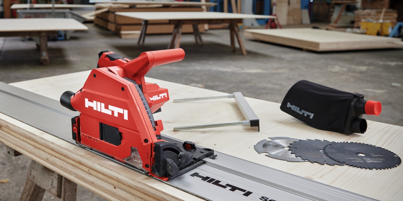 A Hilti saw and blades on a workbench