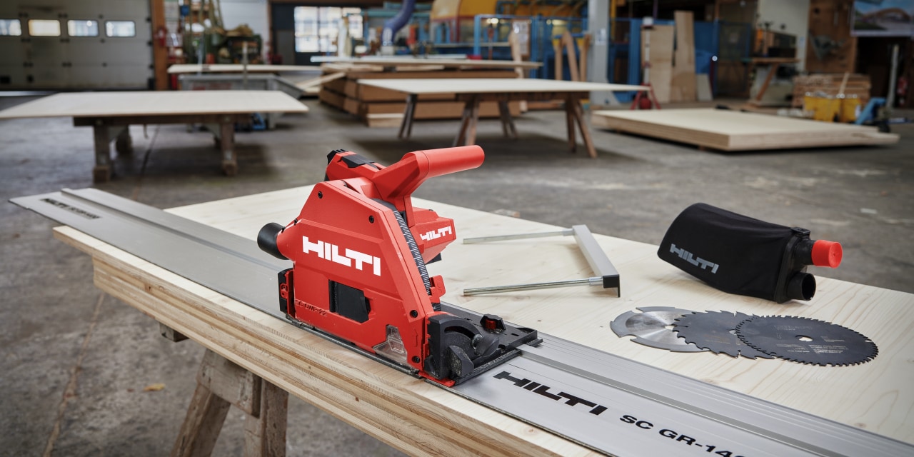 Hilti circular saw and blades on a workbench