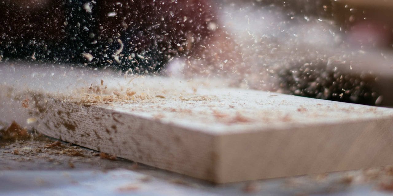 wood with dust around it