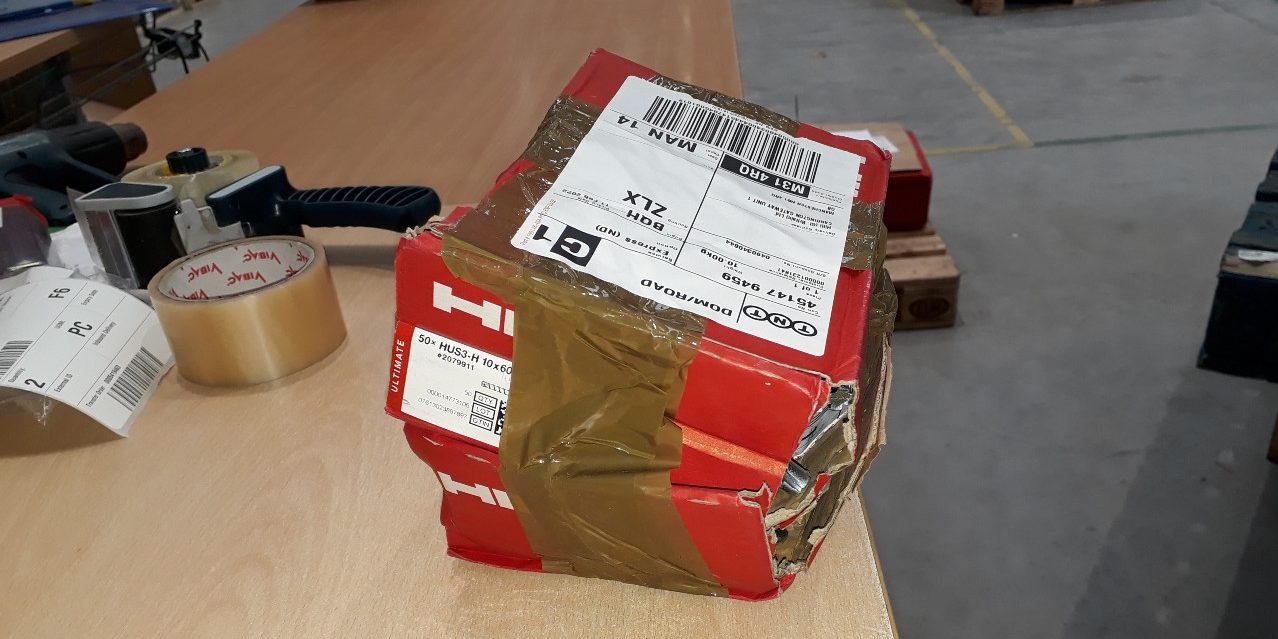 image of a badly packages red box