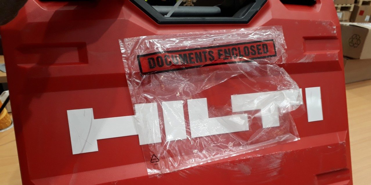 red Hilti tool case with a clear label on the front