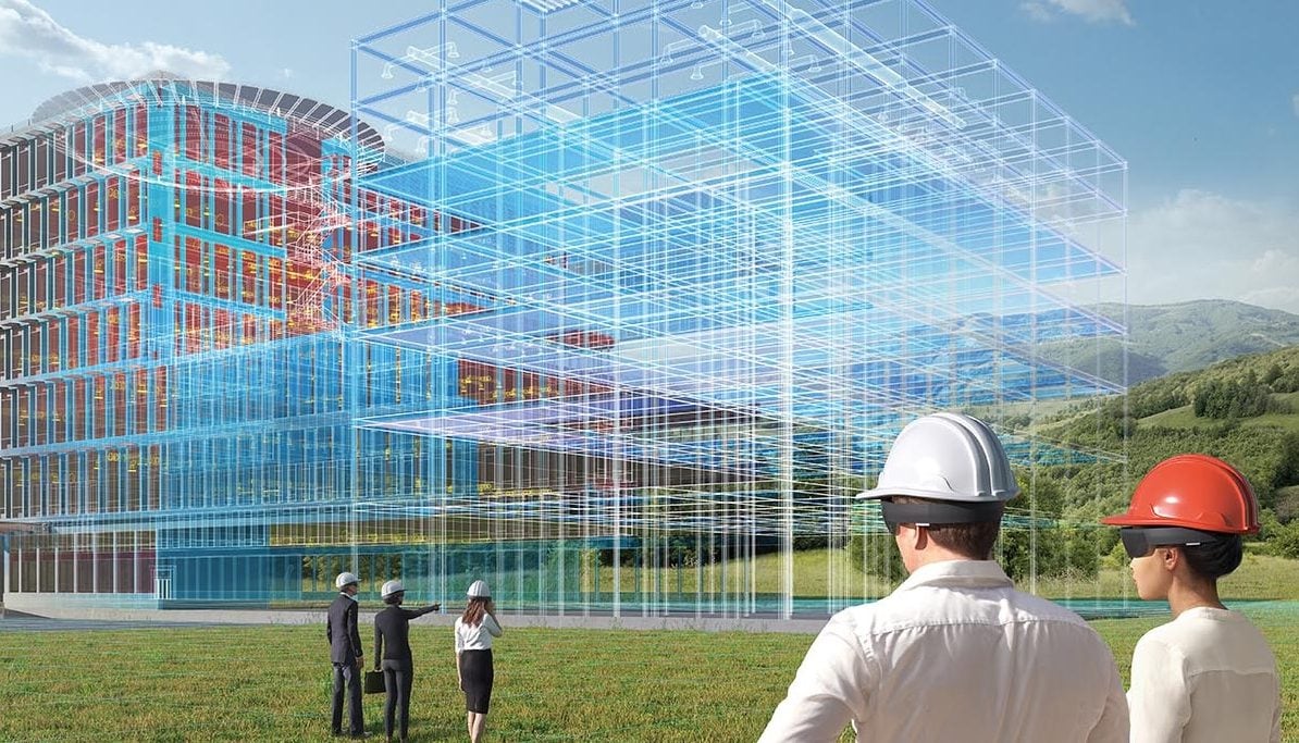 computer generated bim drawing surrounded by people in hard hats