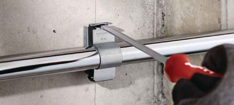 X-SC-FE MX Distance saddle clip Fire-resistant conduit fastener for installing metallic conduits on concrete walls and ceilings with direct fastening tools and collated nails Applications 1